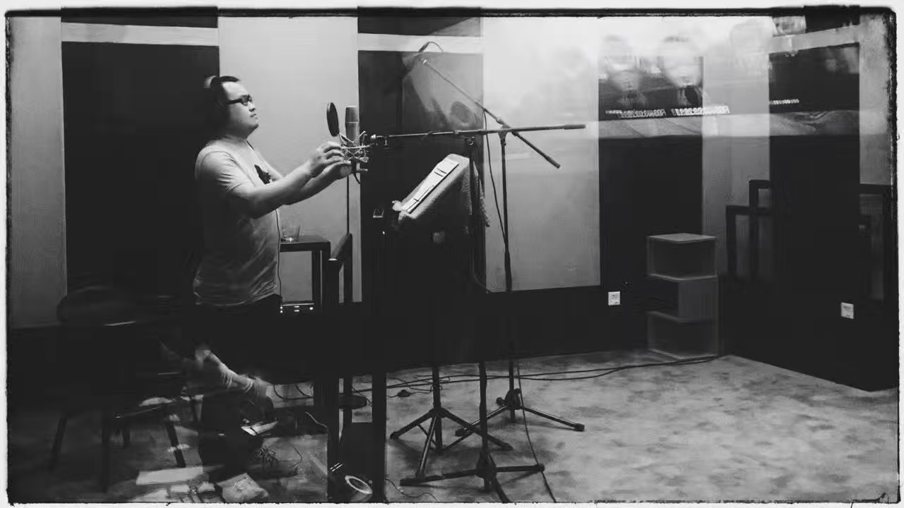Jiang Xiaobei at work in a recording studio